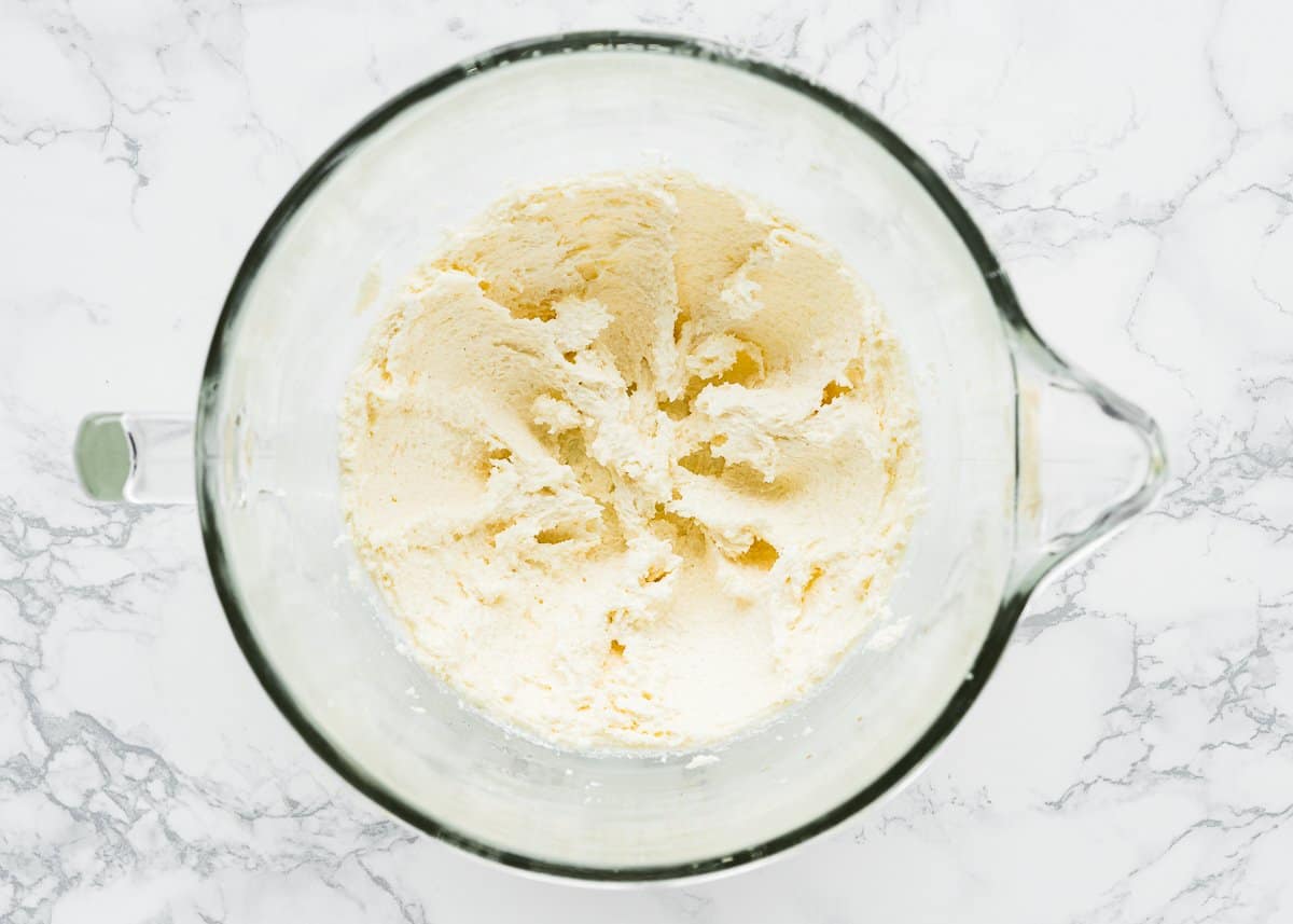 butter and sugar cream together in a stand bowl mixture.