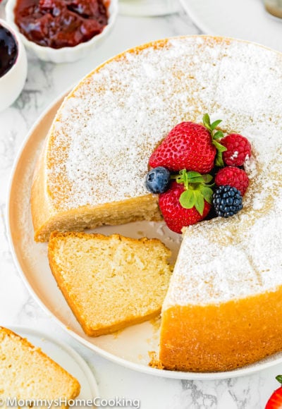 sliced Eggless Cream Cheese Pound Cake on a white serving plate