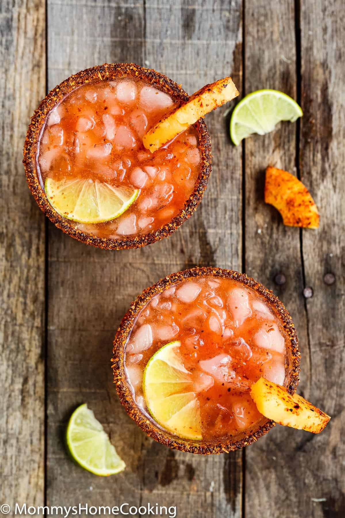Overhead view of two Pineapple Michelada.