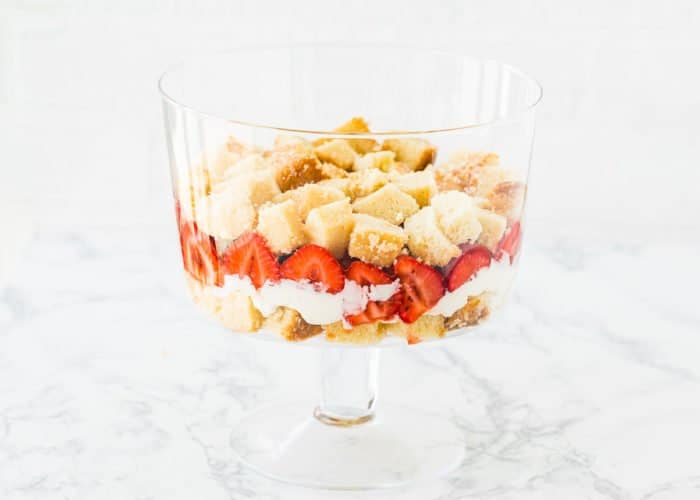 two layers of egg-free trifle in a trifle dish. 