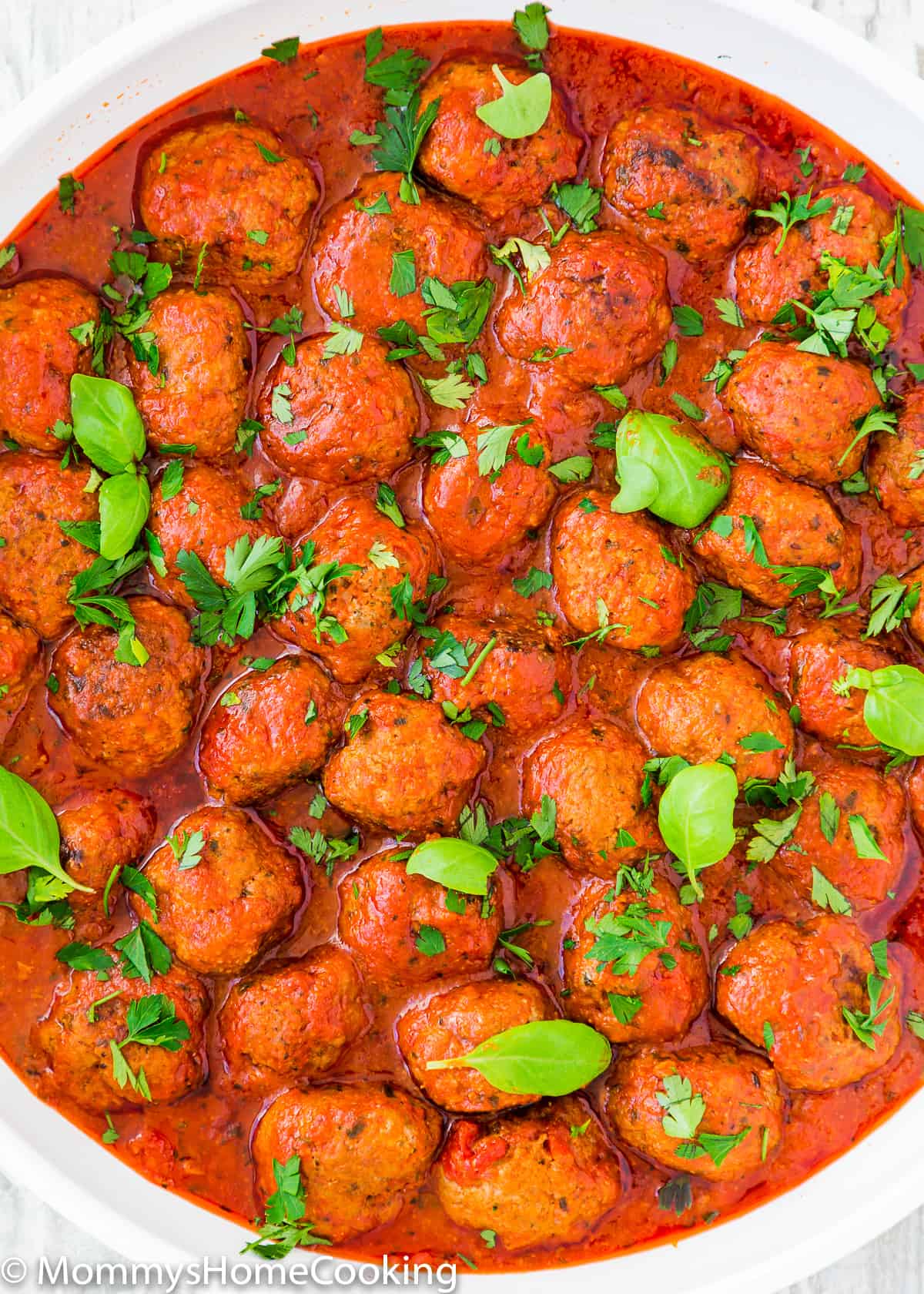 Eggless Italian Meatballs garnished with parsley and basil