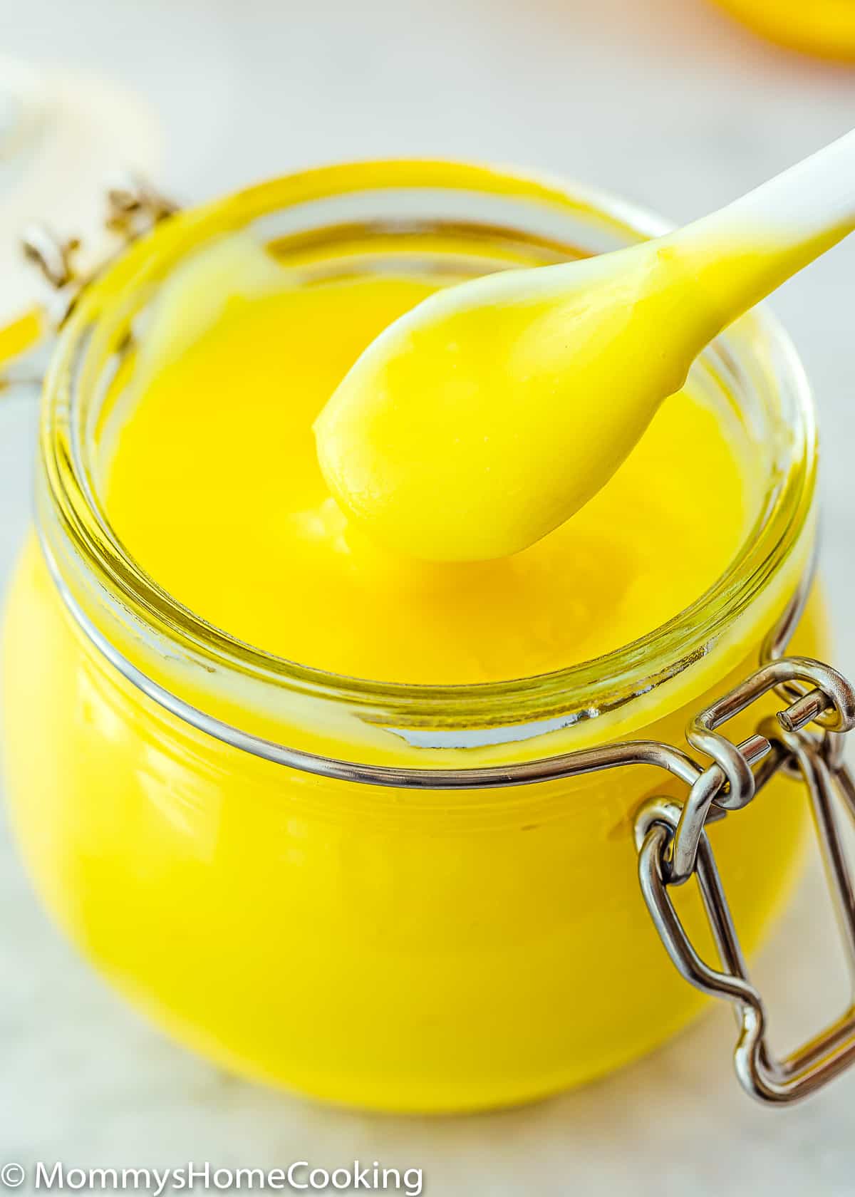 Eggless Lemon Curd with a serving spoon