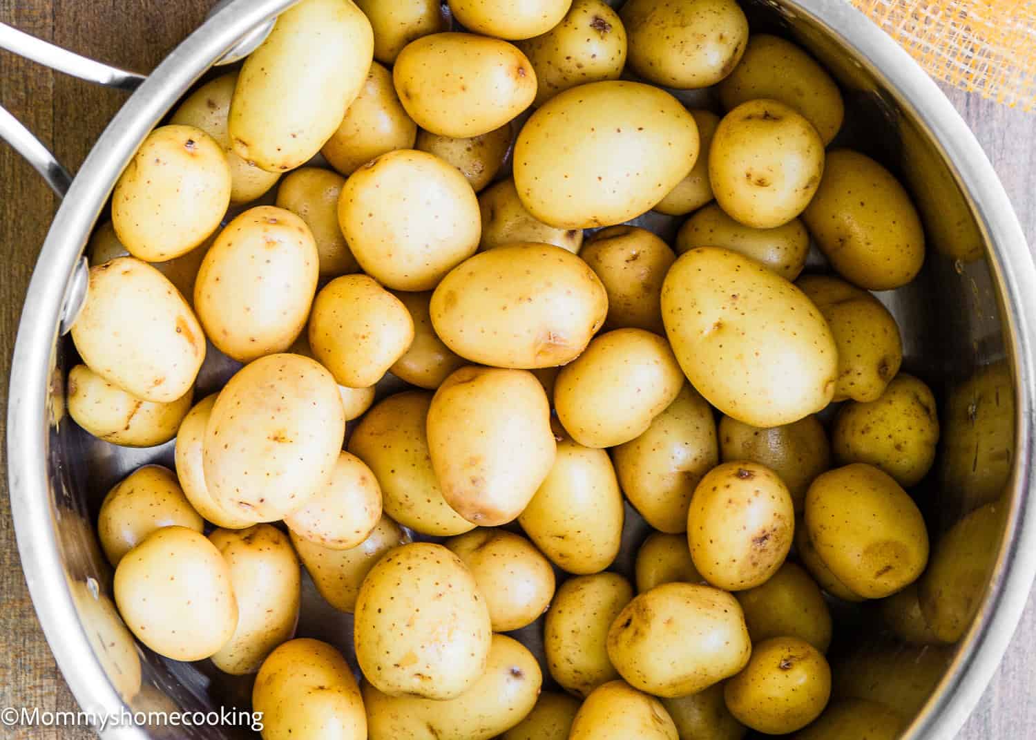 raw potatoes in a pot. 