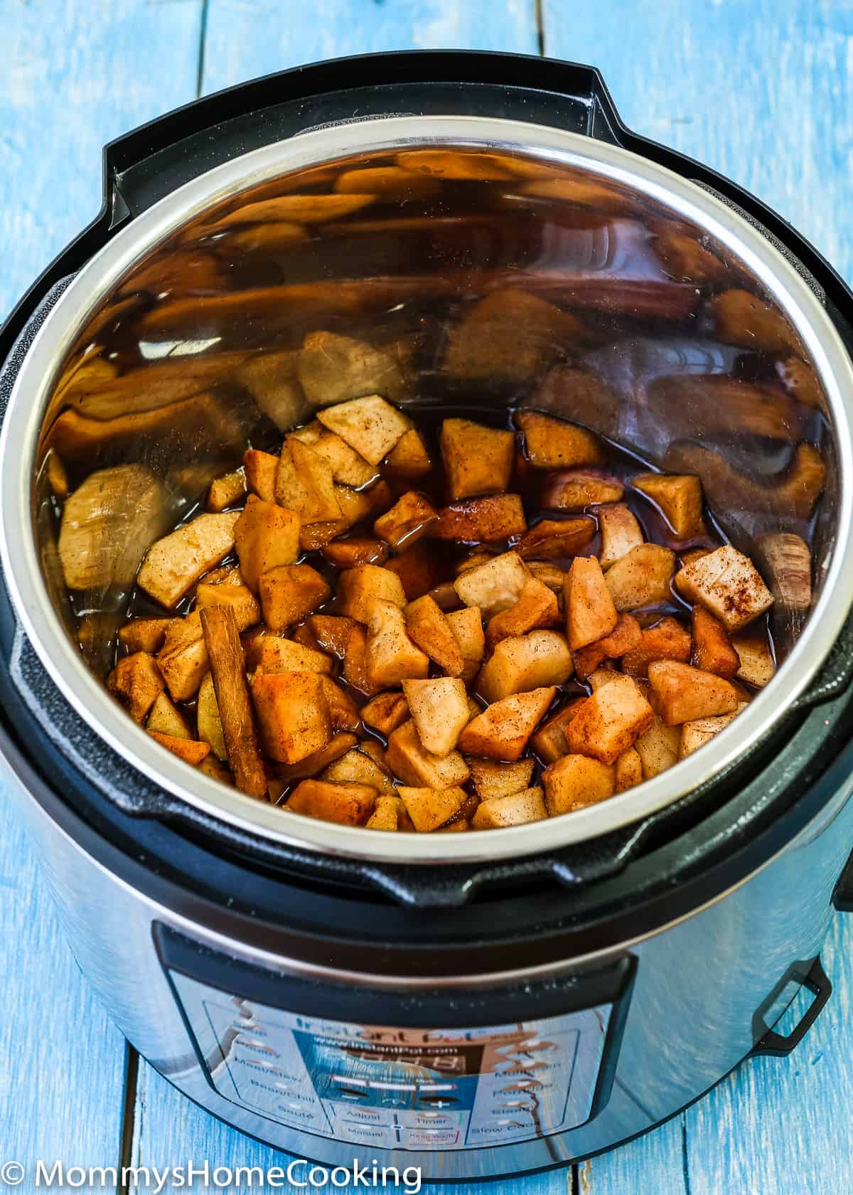 chopped apples with cinnamon in a pressure cooker