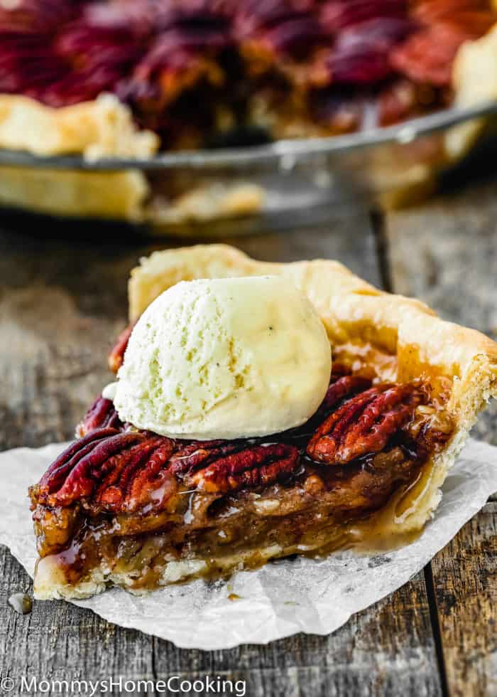 a egg-free pecan pie slice over a piece of parchment paper.