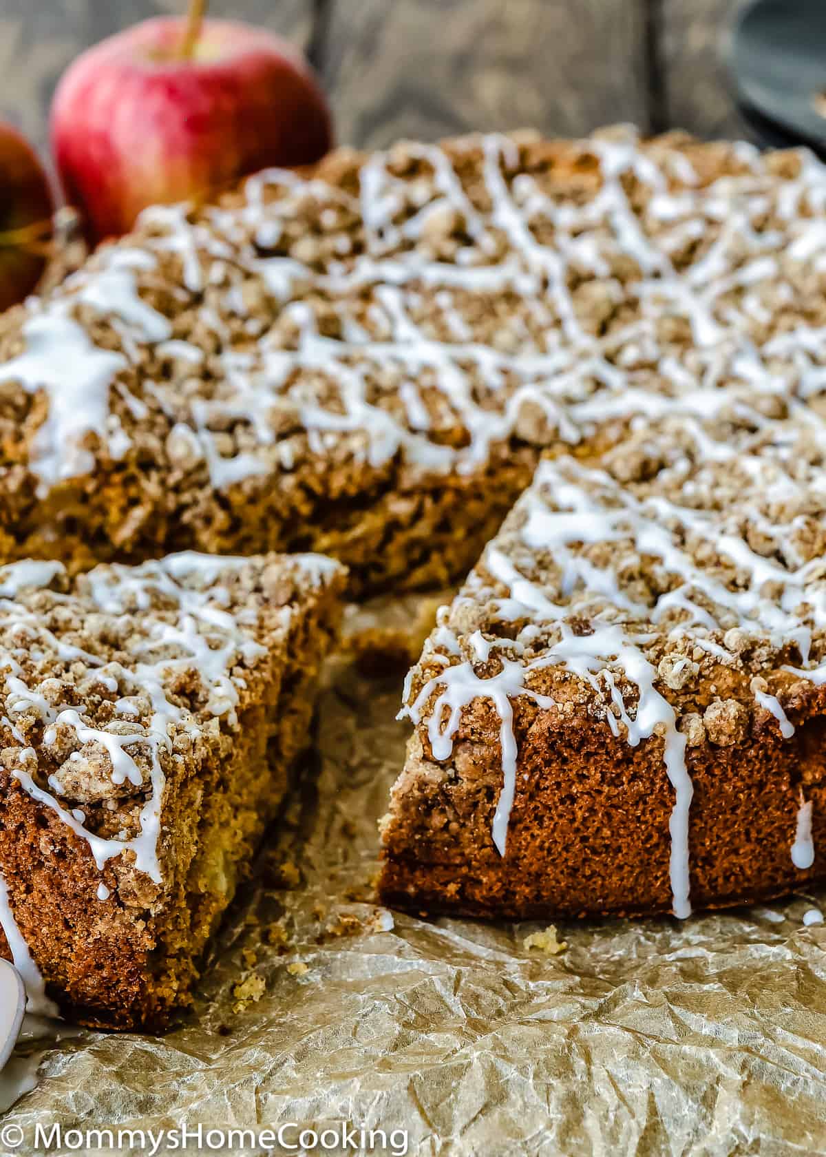 Eggless Apple Maple Spice Cake sliced with sugar glaze.