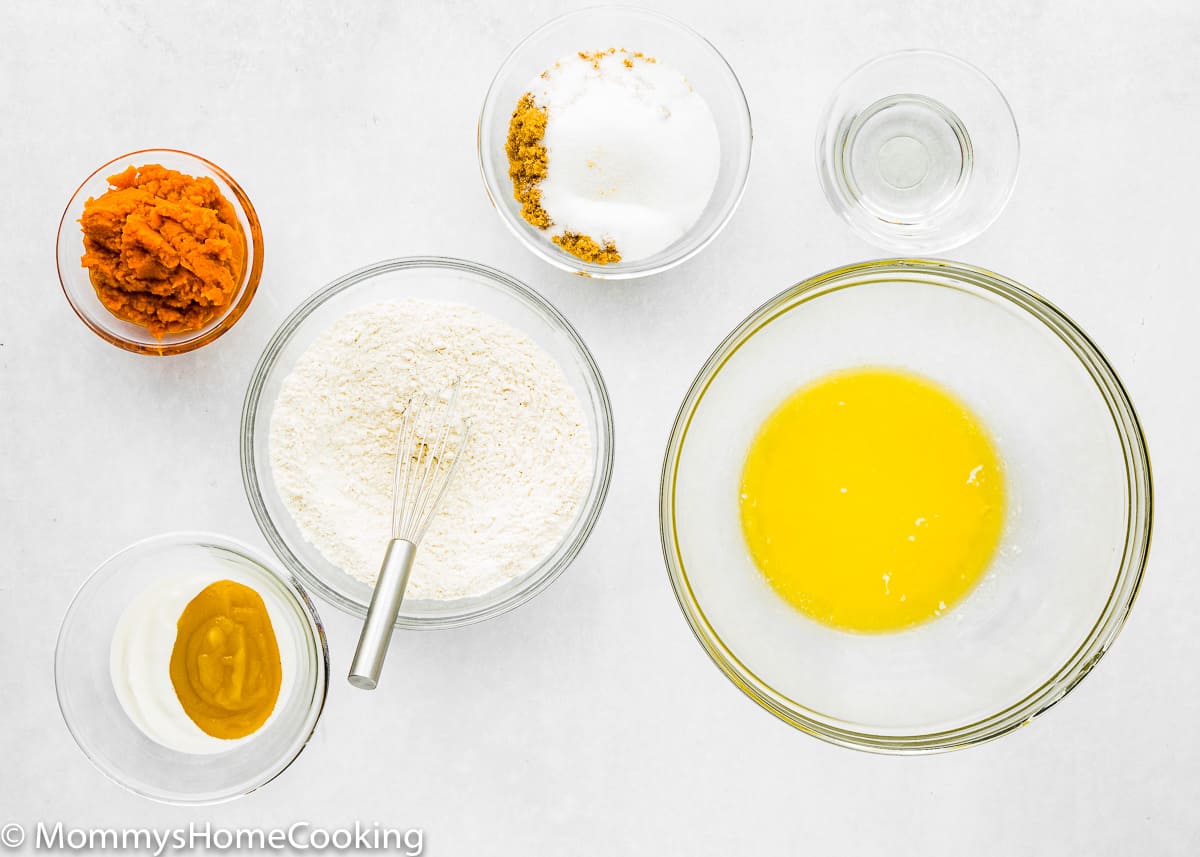 Eggless Pumpkin Bread ingredients over a white surface