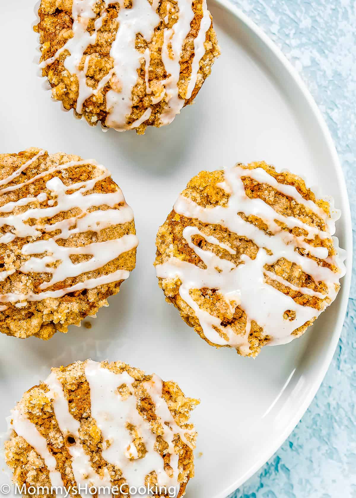 overhead view of Eggless Pumpkin Crumb Muffins on a plate.