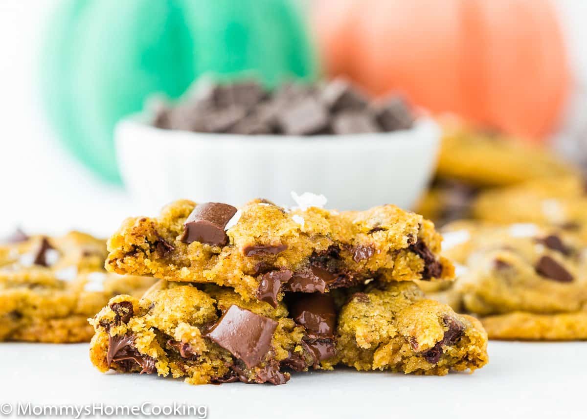 Eggless Pumpkin Chocolate Chip Cookie cut in half showing chewy texture
