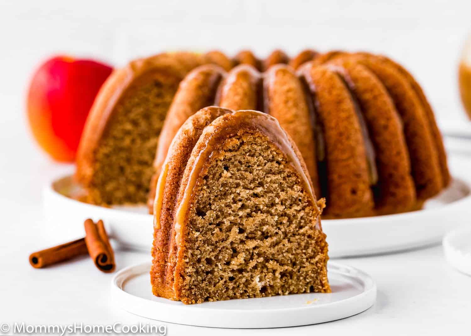 Eggless Apple Cider Donut Cake slice in a plate