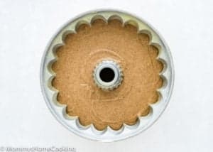 bundt pan filled with Eggless Apple Cider Donut Cake batter