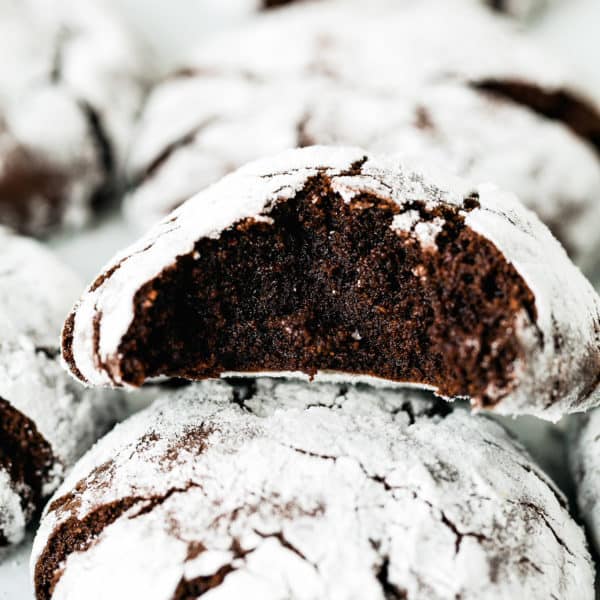 bitten Eggless Chocolate Crinkle Cookie showing inside texture