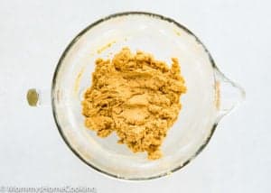 Eggless Peanut Butter Blossom Cookie dough in a mixing ball