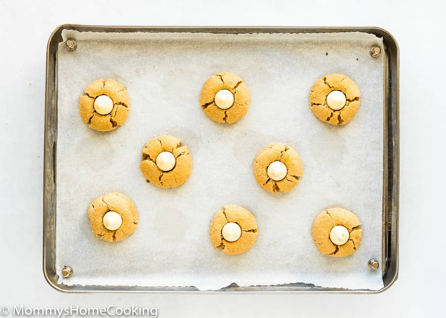 Eggless Peanut Butter Blossom Cookies on a baking tray