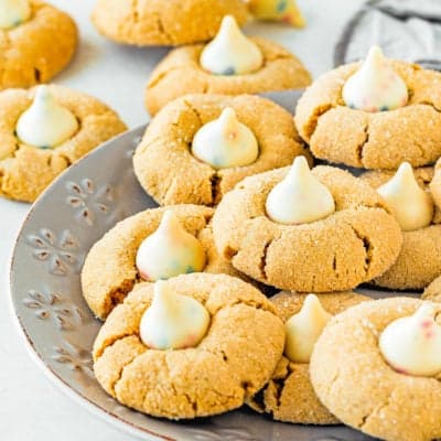 Eggless Peanut Butter Blossom Cookies on a gray plate