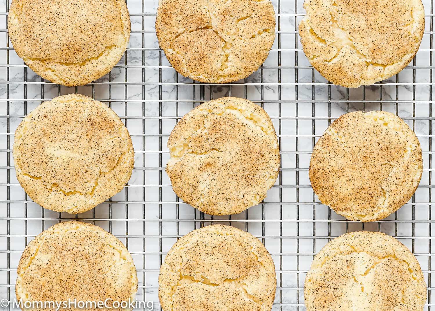 egg-free snickerdoodle cookies on a wired rack.
