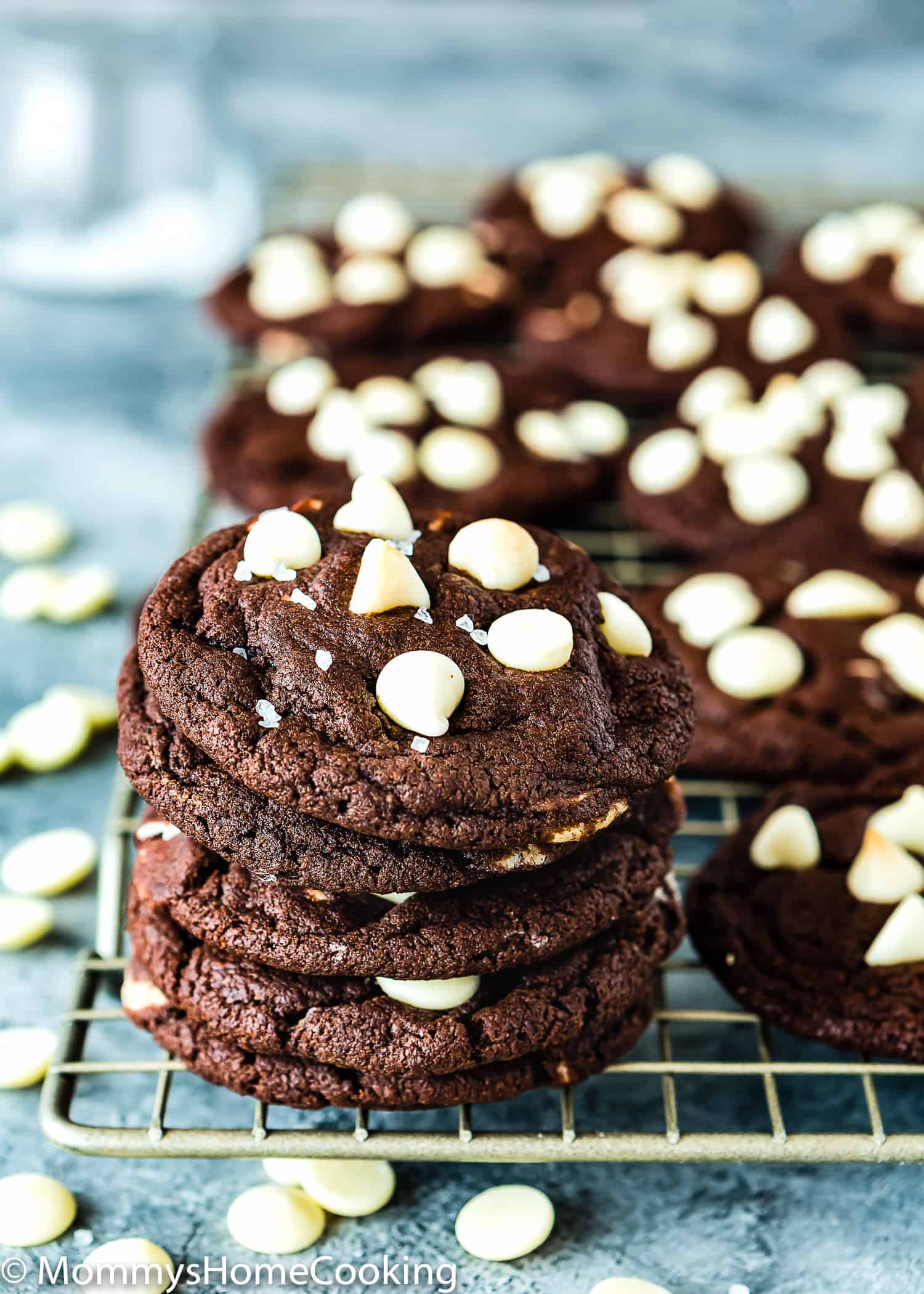 egg-free Chocolate Cookies stack over a wire cooling rack