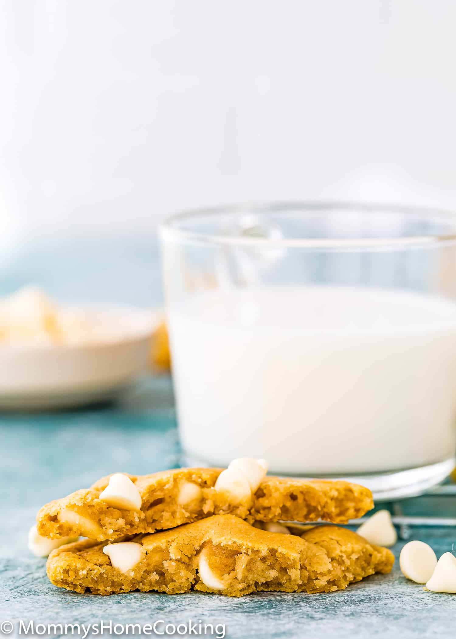 Egg-free White Chocolate Cookie next to a glass of milk