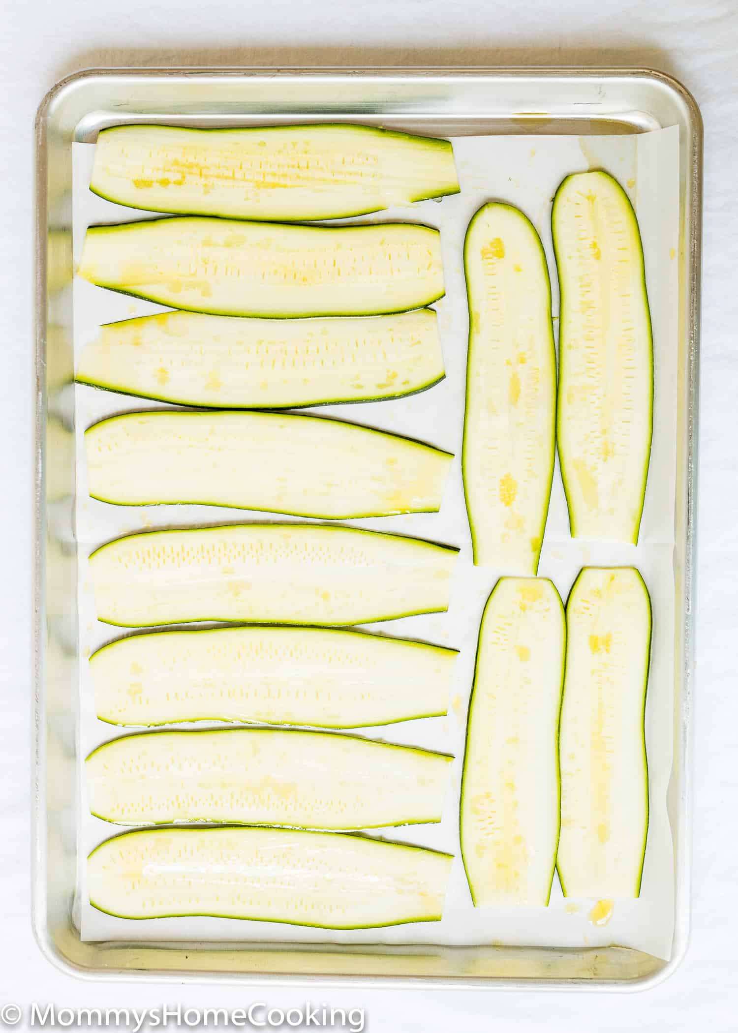 slices of zucchini on a baking tray