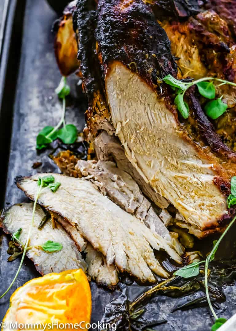 Venezuelan Pernil sliced on a baking tray