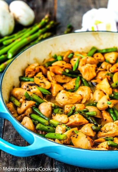 blue skillet with Healthy Chicken and Asparagus with sauce