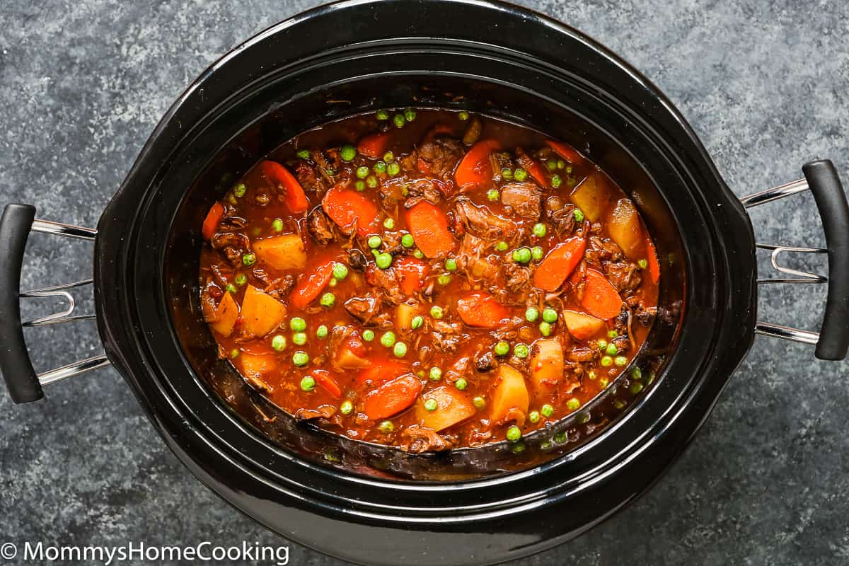 a slow cooker with slow cooker stew