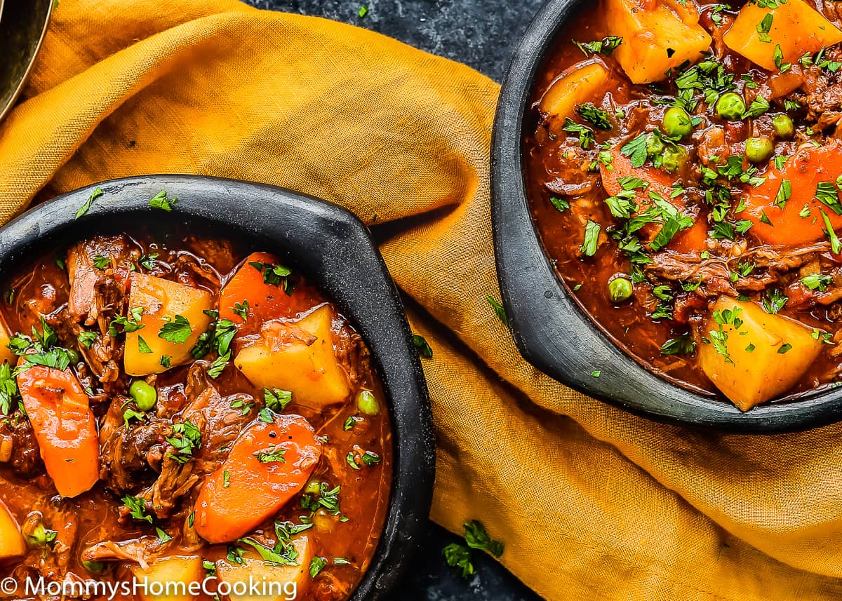 two-bowl overhead view with slow cooker oxtail stew
