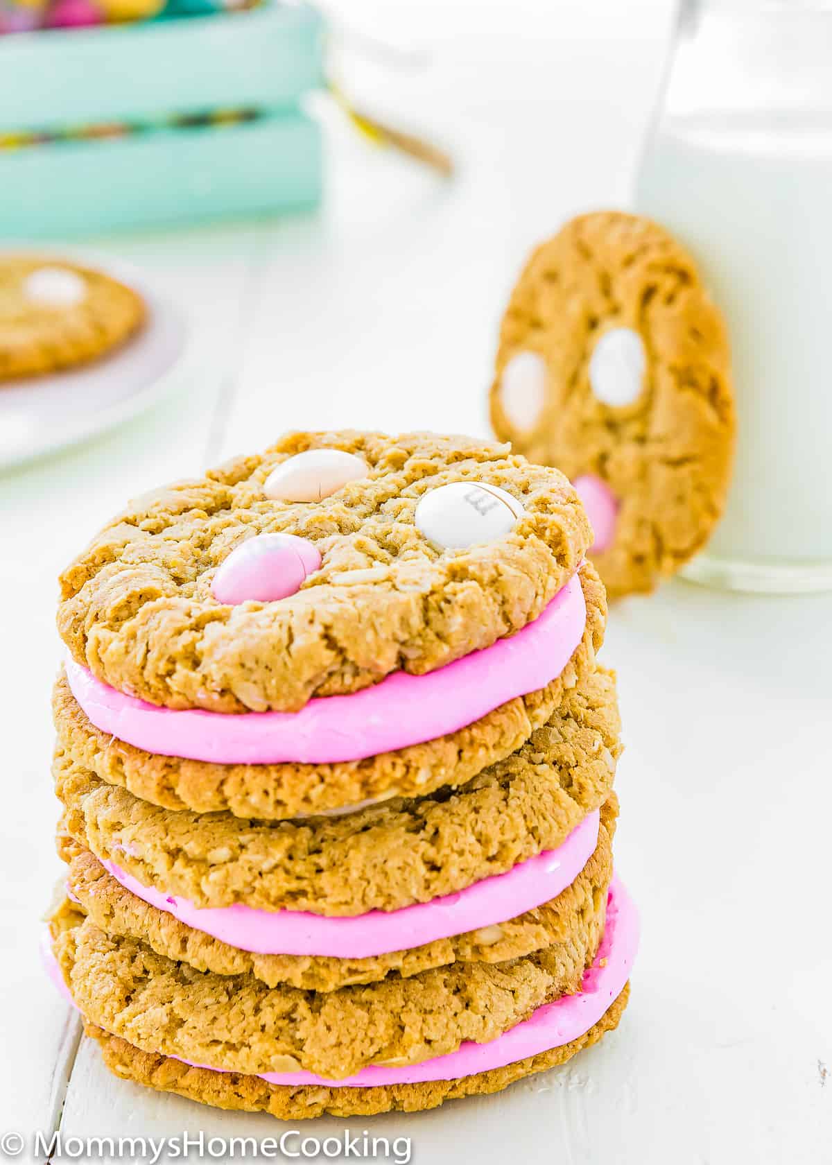 a pile of three two egg-free oatmeal sandwich cookies.