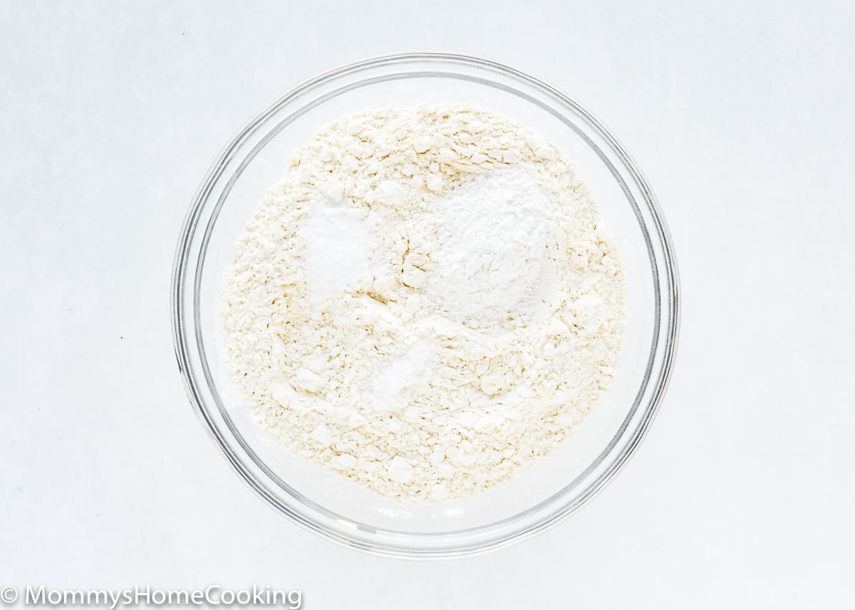 dry ingredients needed to make egg-free cake in a bowl.