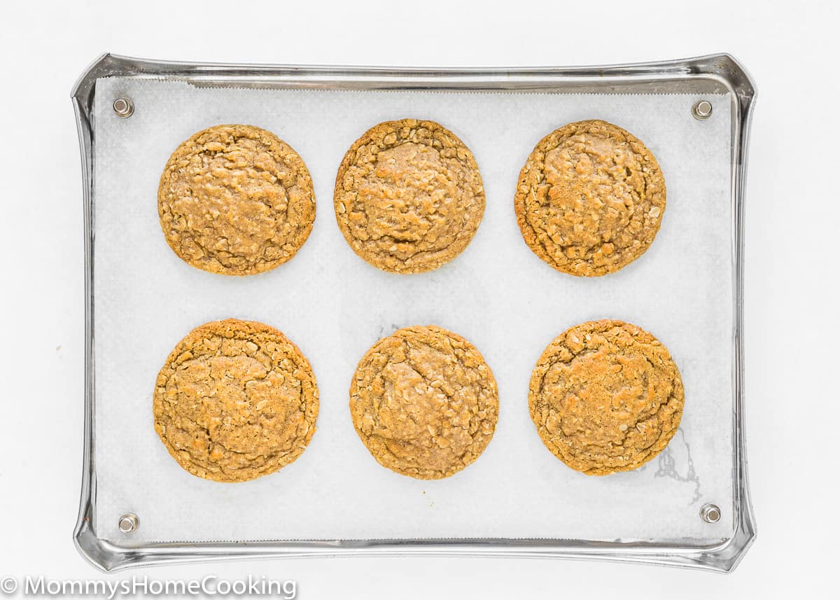 baked eggless oatmeal cookies in a baking tray.