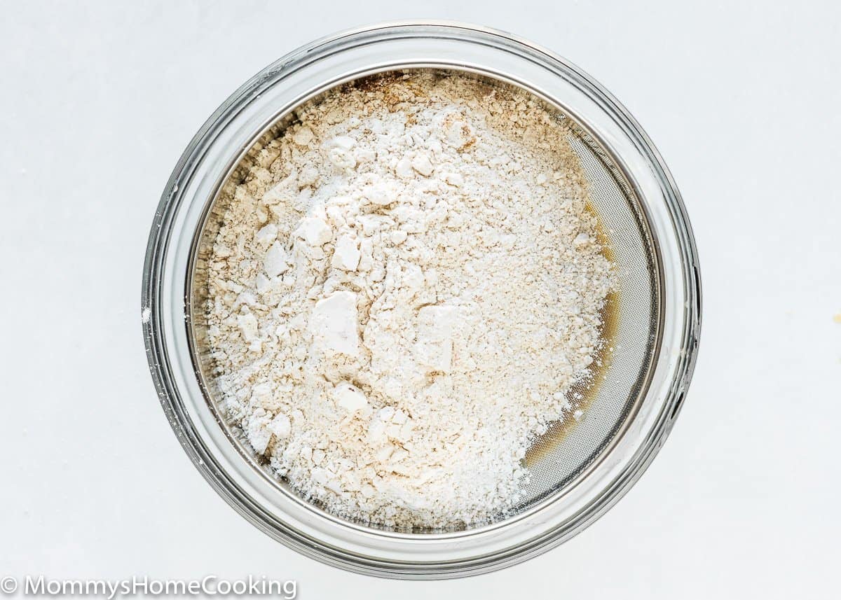 flour, baking powder and baking soda in a sifter.