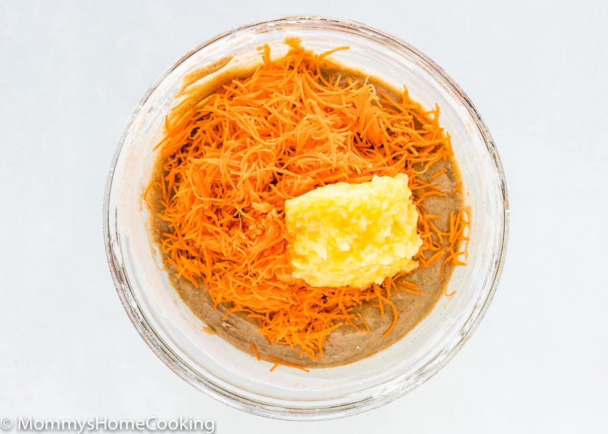 shredded carrots and crushed pineapple other egg-free cake batter in a bowl.
