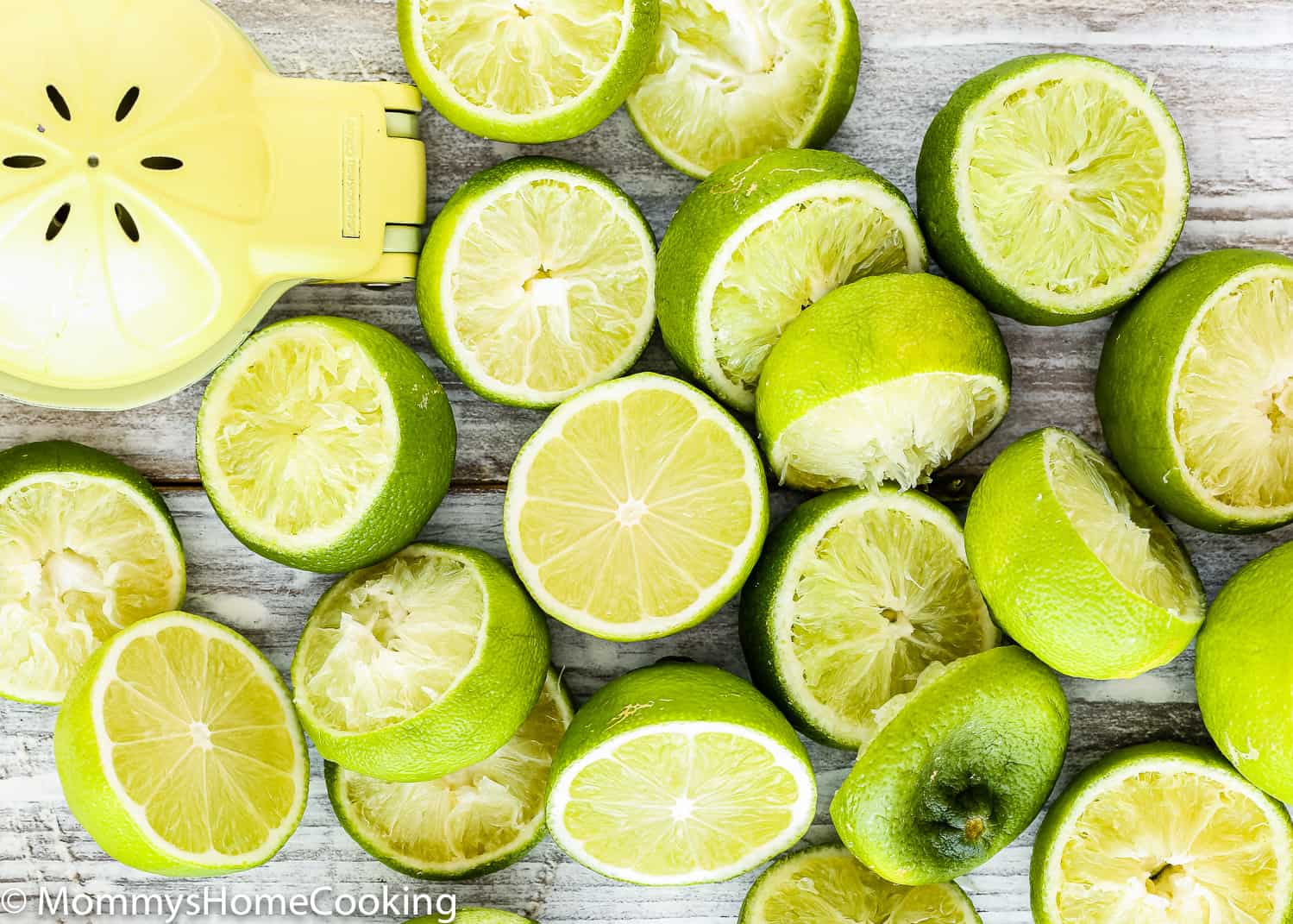 key limes with a citrus squeezer.