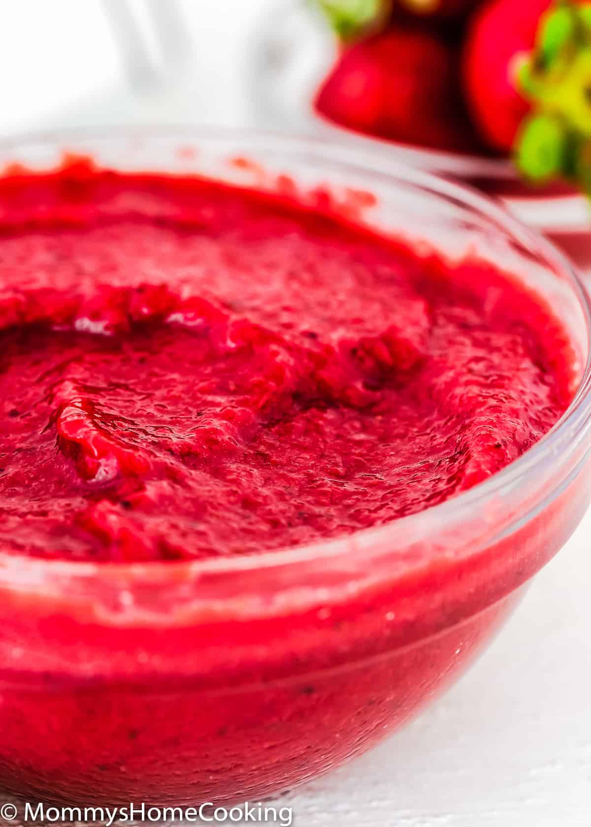 homemade strawberry puree in a bowl.