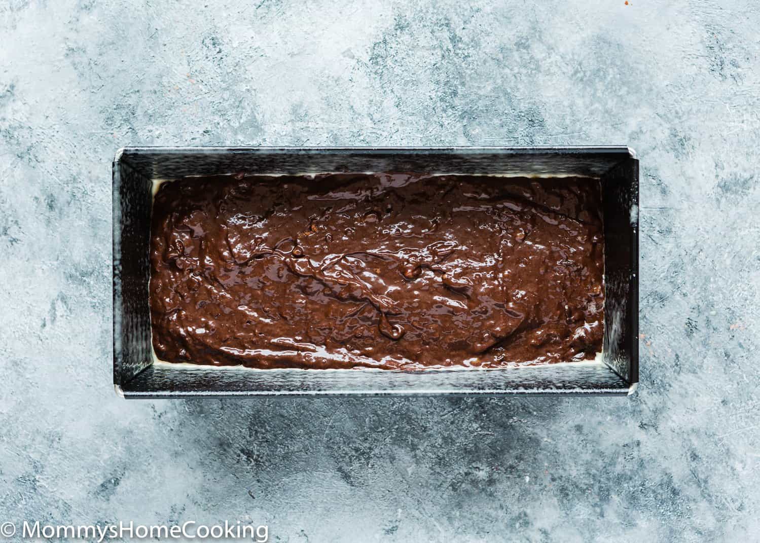 Eggless Chocolate Banana Bread batter in a loaf pan.