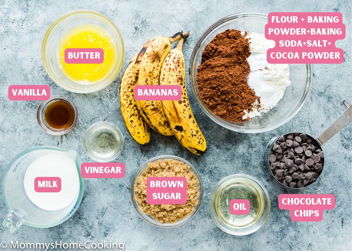 ingredients needed to make eggless chocolate banana bread over a blue surface with name tags.