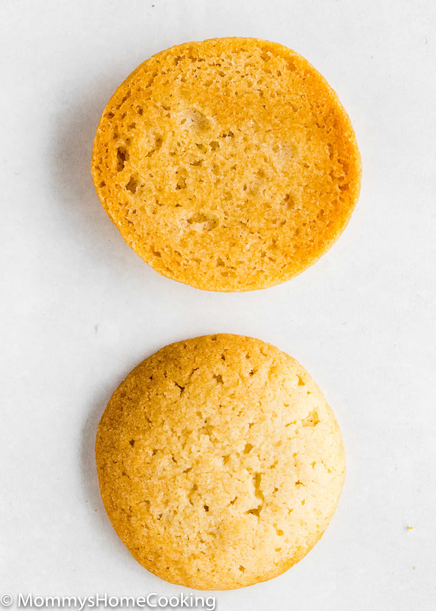 two Eggless homemade Vanilla Wafers showing the front and back texture.