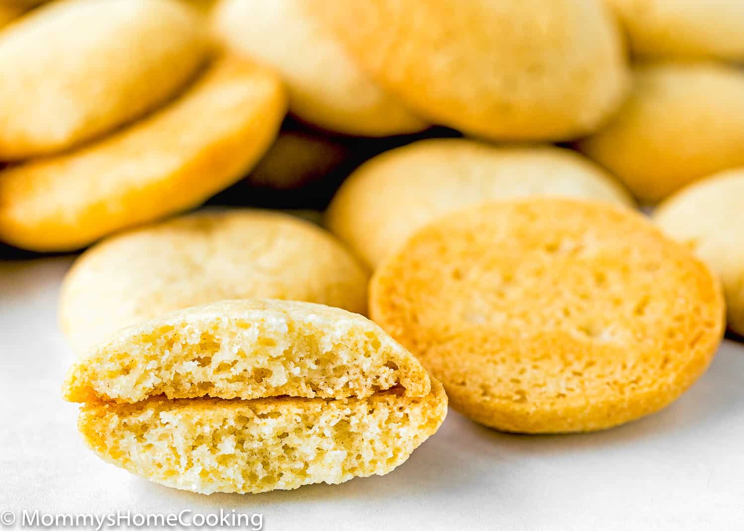 an Eggless Vanilla Wafers cut into half showing its perfect inside texture.
