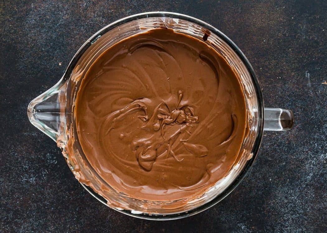 Eggless Chocolate Cheesecake batter  into a bowl. 