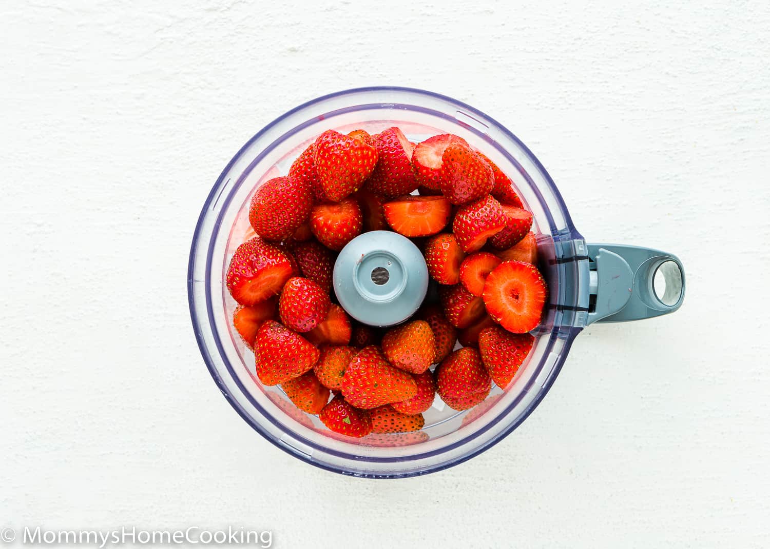 strawberries in a food processor.