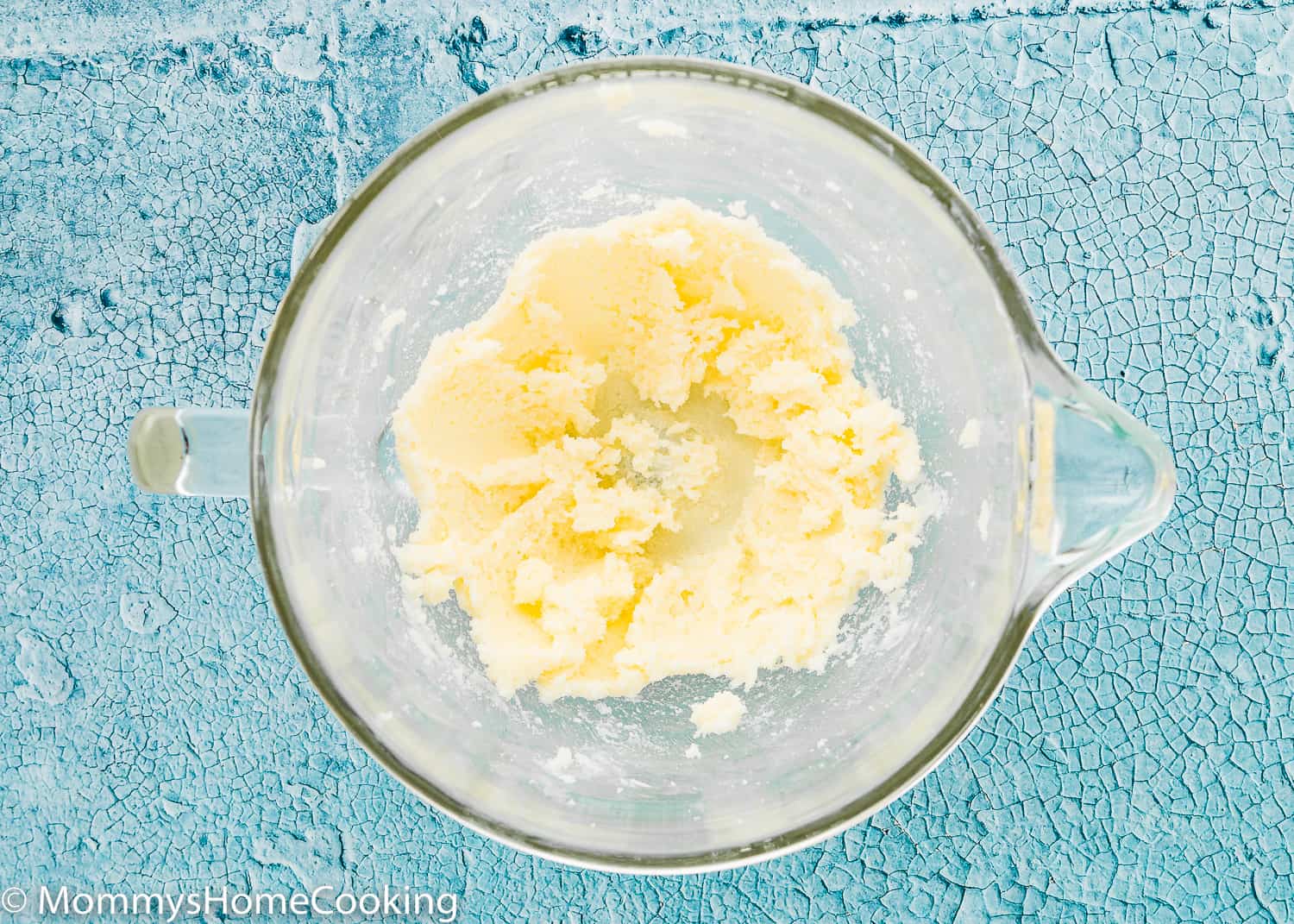 butter and sugar mix together in a glass bowl.