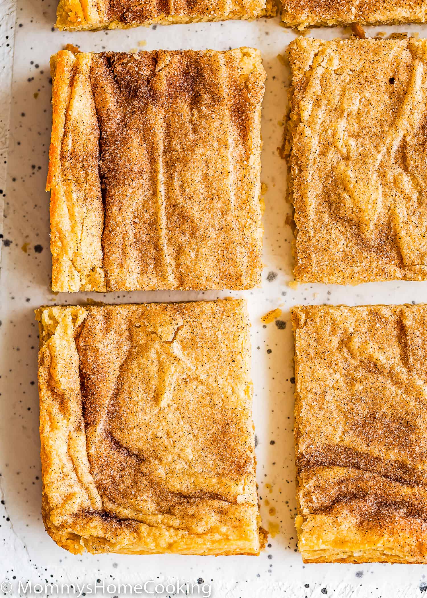 egg-free Snickerdoodle Bars over a white surface.