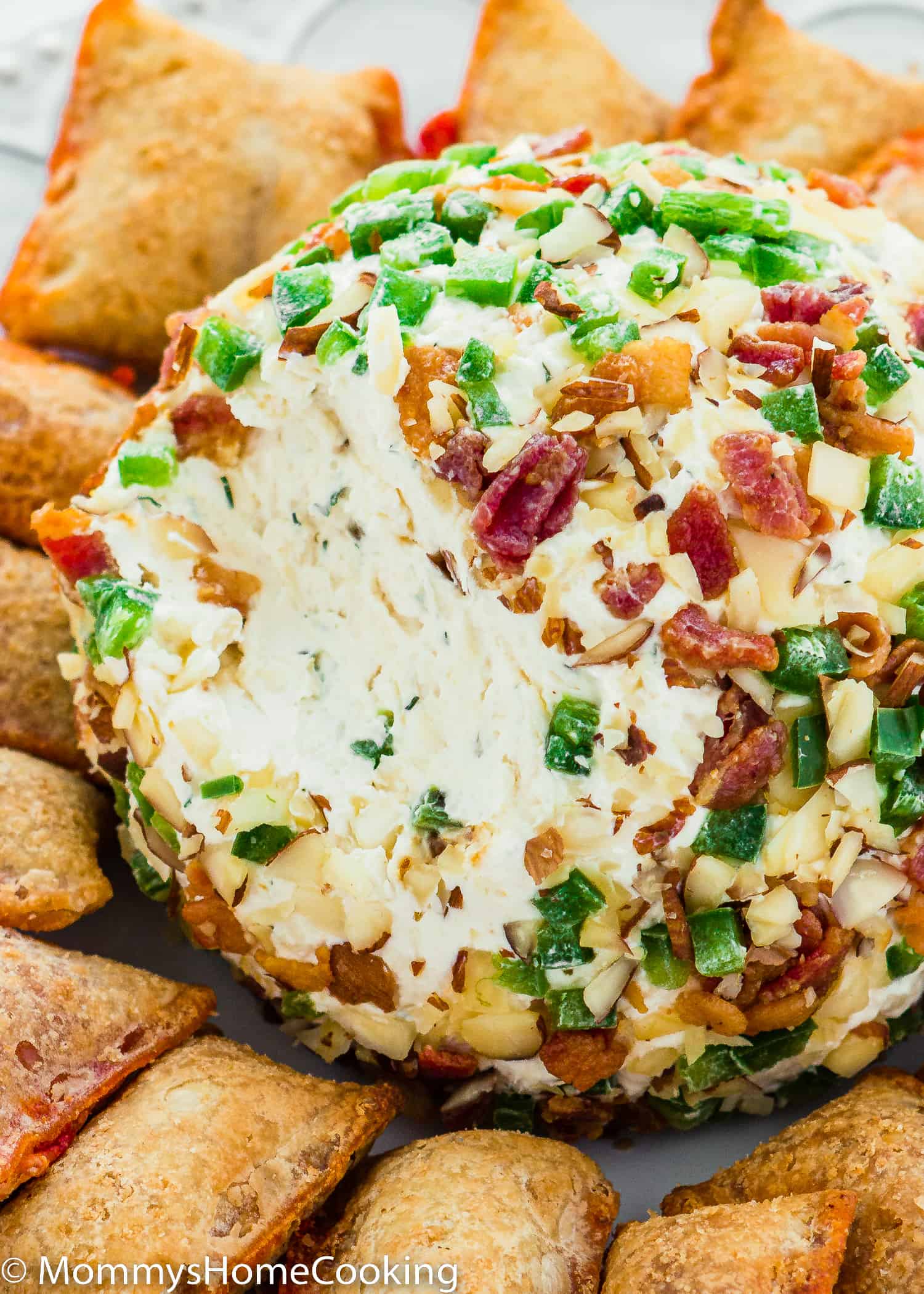 Bacon and Jalapeño Cheese Ball on a plate.