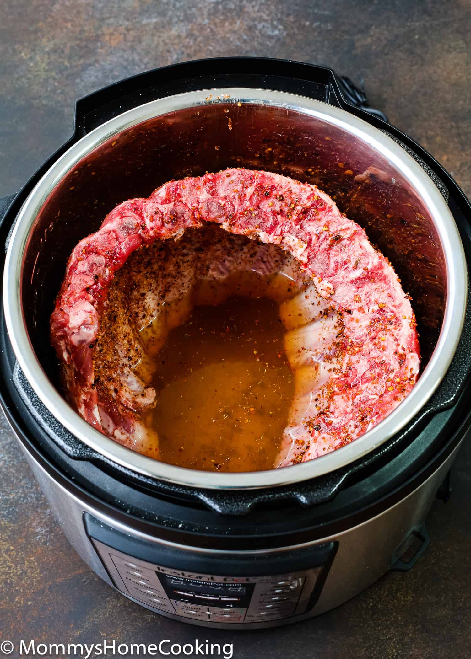 Uncooked Ribs in an instant pot pressure cooker.