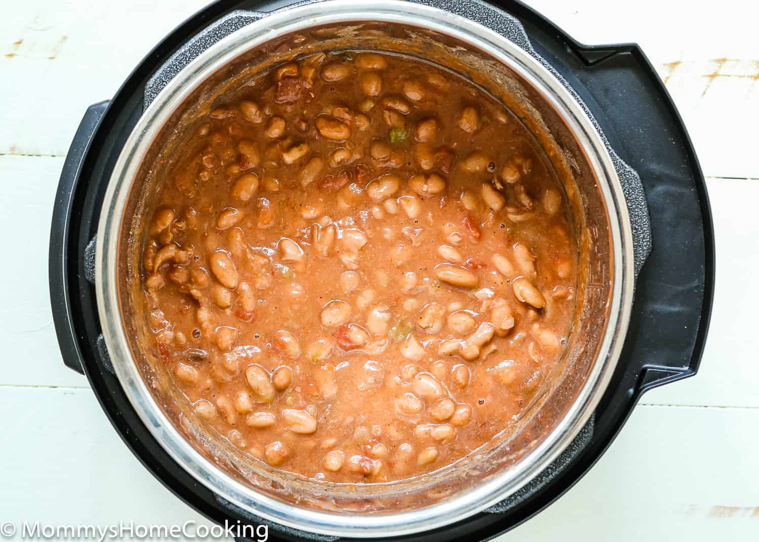cooked drunken beans in a pot.