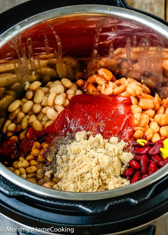 ingredients needed to make Homemade baked beans in a pot.