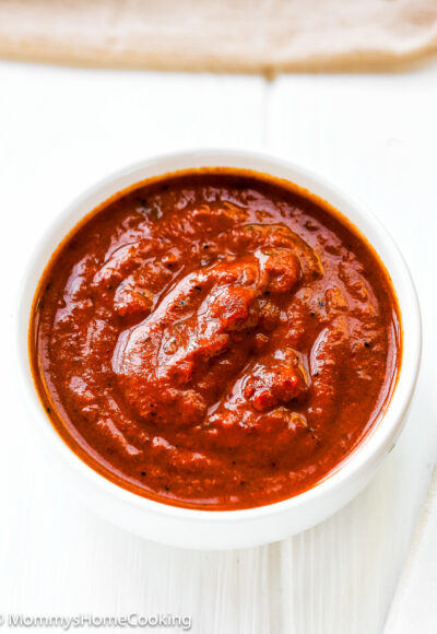 chipotle peppers in abodo sauce in a small white bowl.