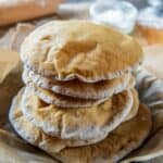 Stack of homemade pita bread. Freshly baked. Round flatbread that can be stuffed with food.