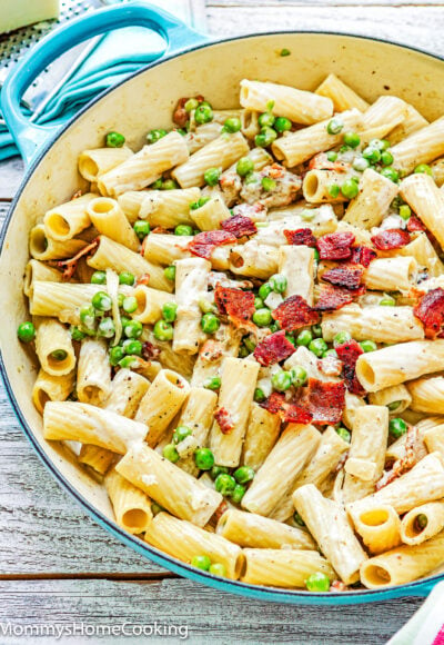 One-Pot Creamy Bacon Alfredo Pasta with peas in a large pot.