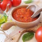 Mediterranean cuisine. Provencal sauce of ripe tomatoes, olive oil and basil and ingredients